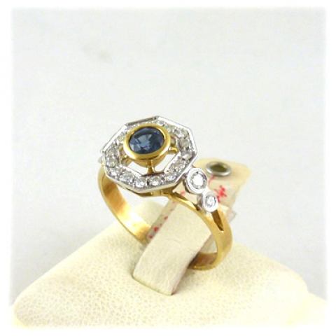 Anello in oro giallo e bianco 18kt. zaffiro blu e diamanti