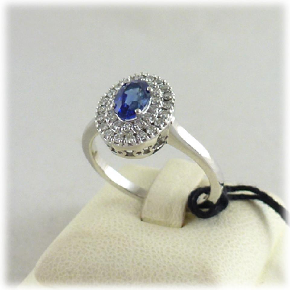 Anello in oro bianco zaffiro blu e diamanti