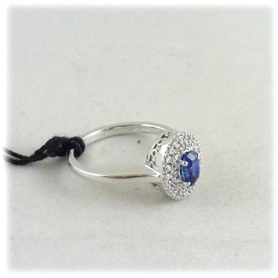 Anello in oro bianco zaffiro blu e diamanti