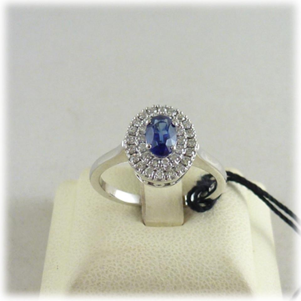 Anello in oro bianco zaffiro blu e diamanti
