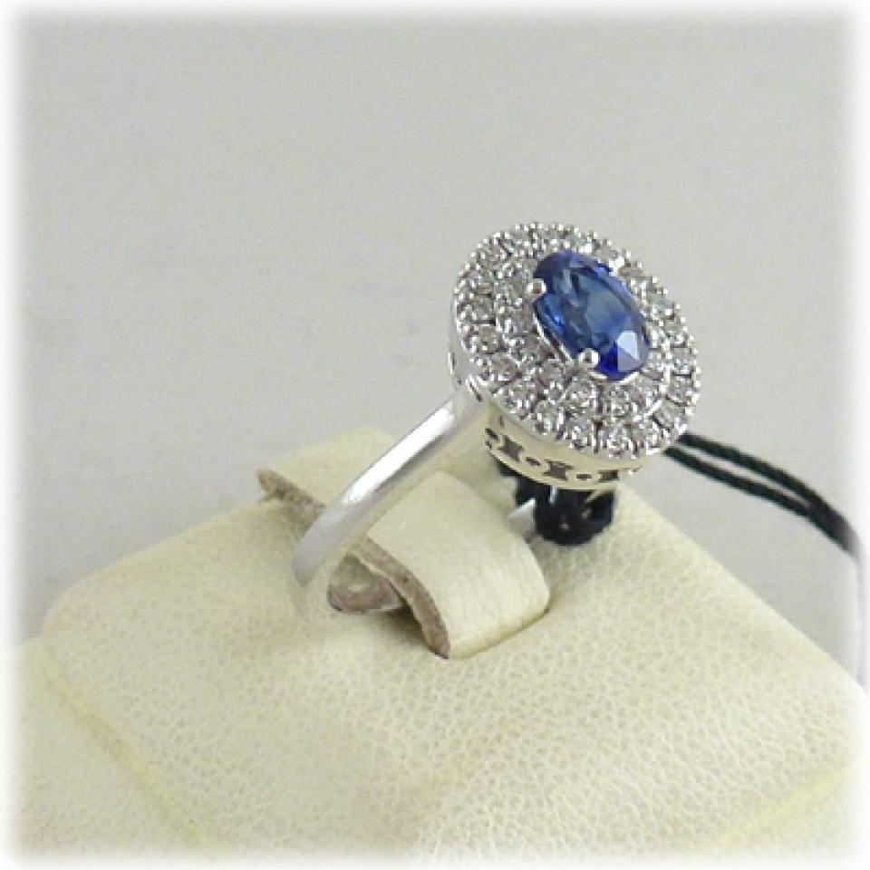 Anello in oro bianco zaffiro blu e diamanti