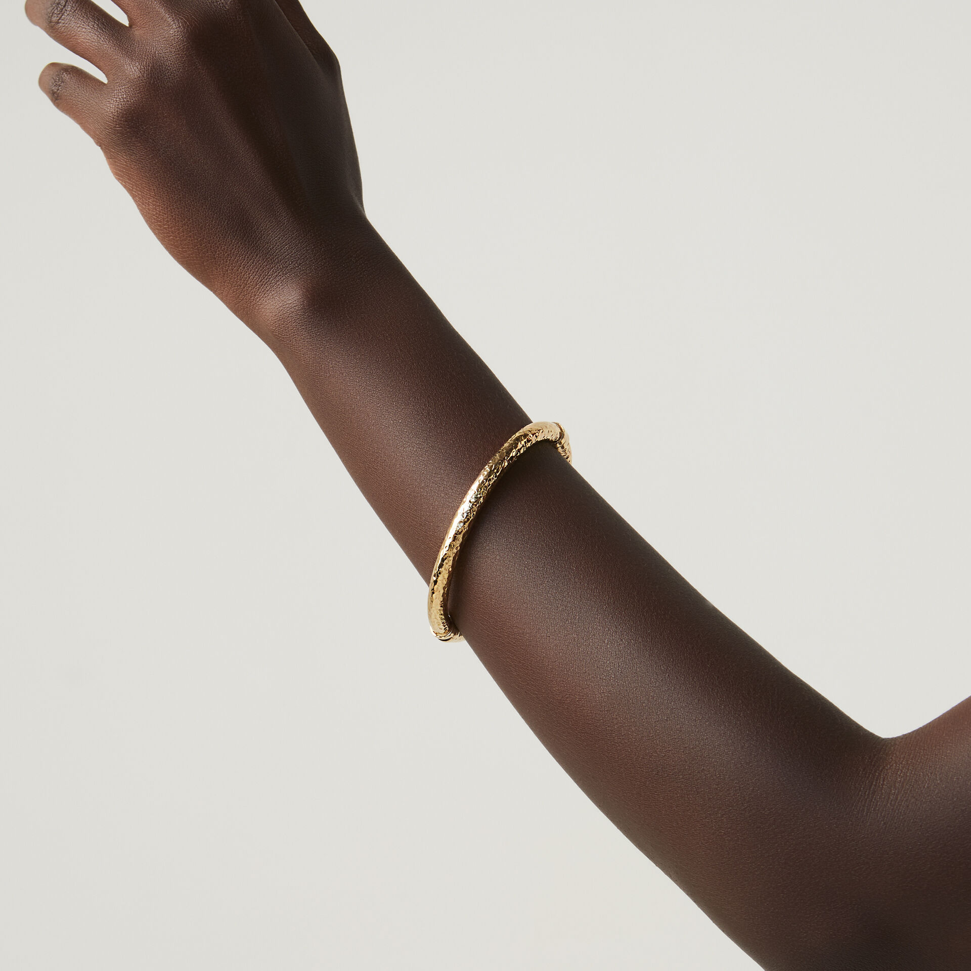 Bangle Rock Raspini in argento placcato oro 18 kt.
