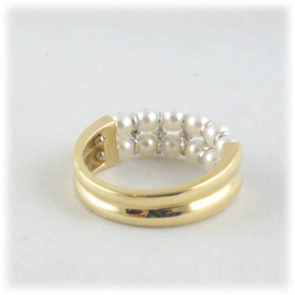 Anello in oro giallo, oro bianco perle e diamanti