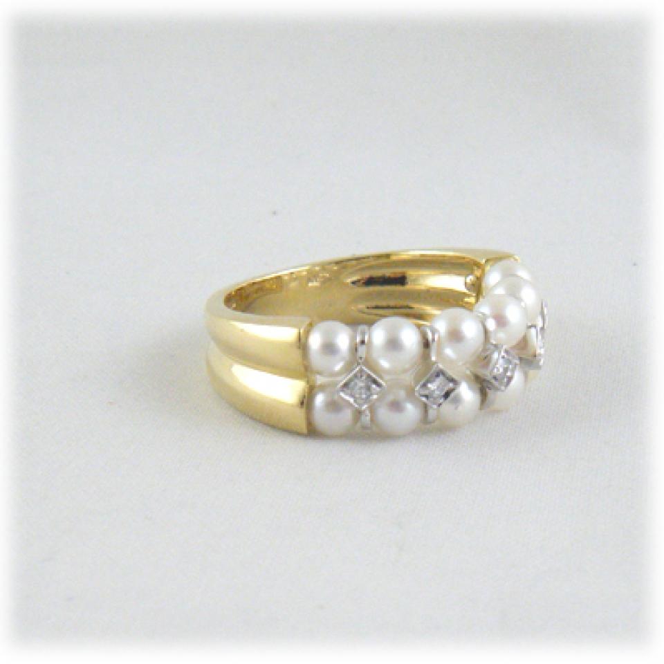 Anello in oro giallo, oro bianco perle e diamanti