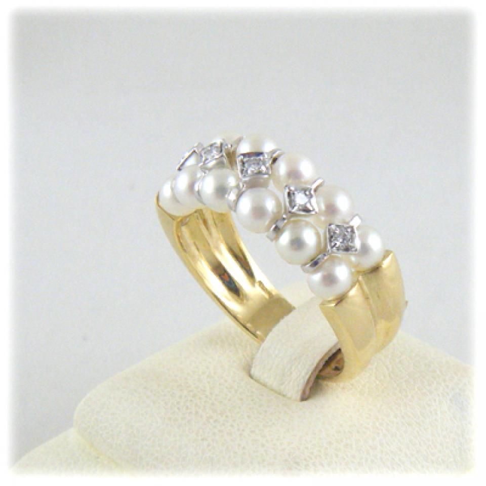 Anello in oro giallo, oro bianco perle e diamanti